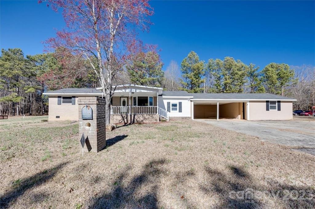 2887 State Rd S-29-330 Lancaster, SC 29720 - Photo 1 of 28 a view of a house with a backyard