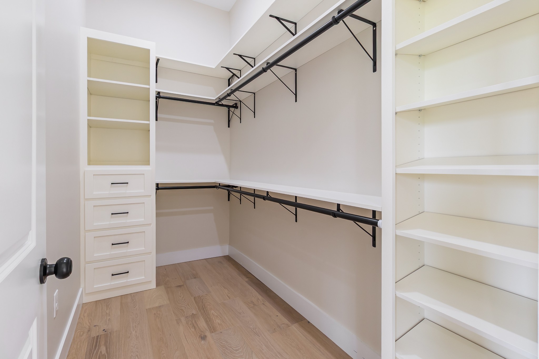 188 Beartown Road Loretto, TN 38469 - Photo 22 of 33 a view of walk in closet with empty racks