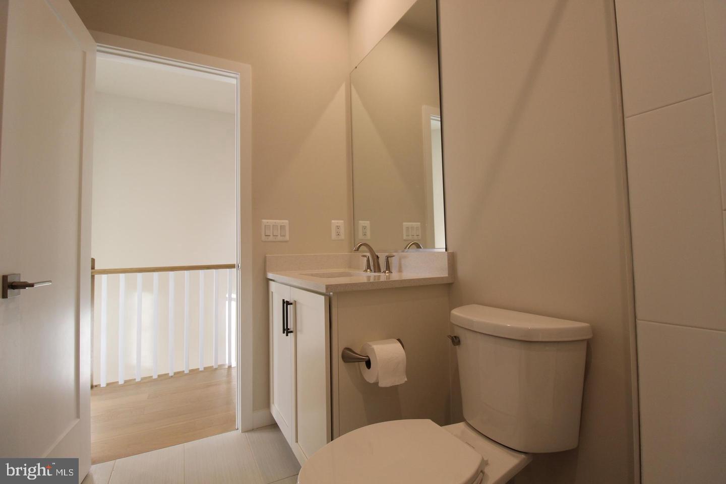 22383 Roanoke Rise Terrace Ashburn, VA 20148 - Photo 31 of 41 a bathroom with a toilet a sink and shower