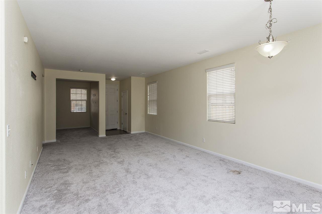 380 Terracina Way Reno, NV 89521 - Photo 3 of 25 an empty room with windows and entrance