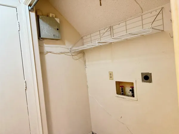 a view of a refrigerator in a kitchen