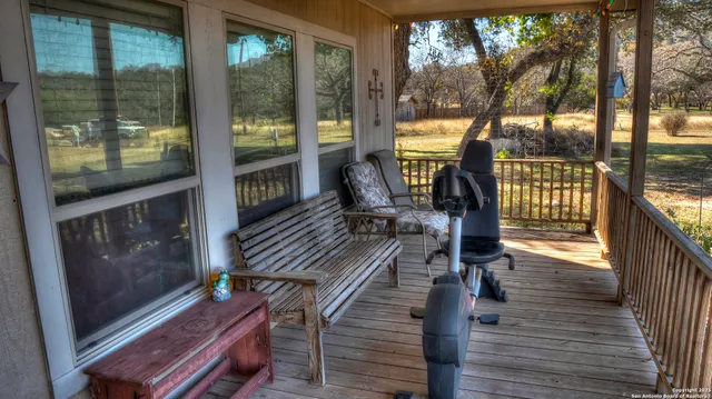 a view of balcony and wooden floor