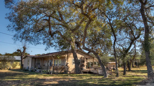 a view of a town with large trees