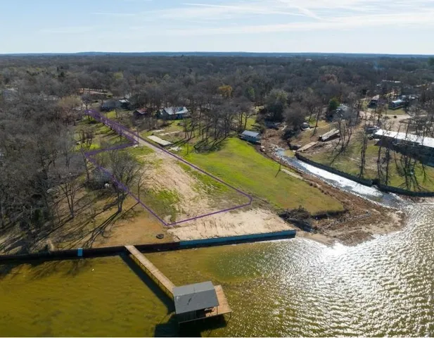 a view of a swimming pool with a lake view