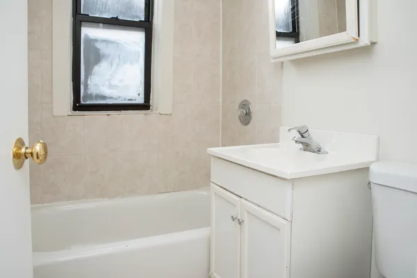 a bathroom with a sink and a bathtub