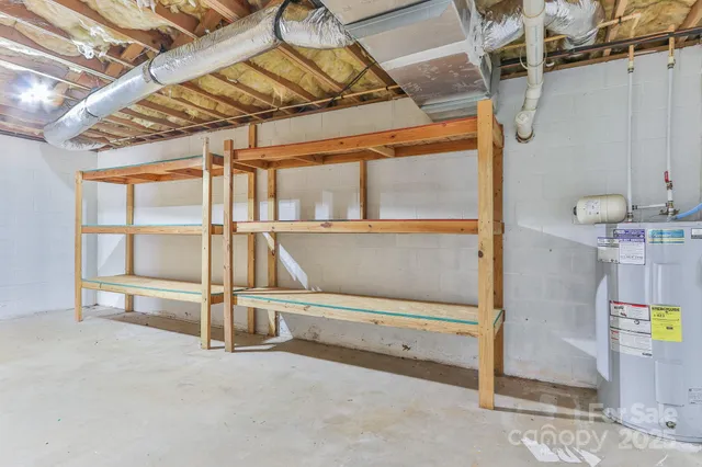 a front view of a house with a yard table and chairs