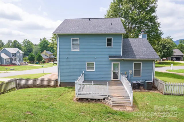 a swimming pool view with a outdoor seating