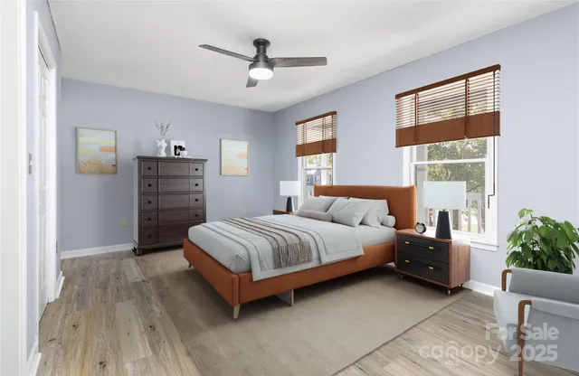 a bedroom with a bed and window