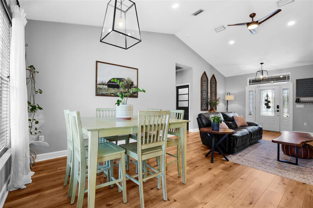 24825 Northwest 201st Road High Springs, FL 32643 - Photo 11 of 31 a living room with furniture and wooden floor