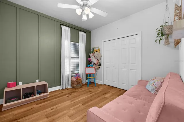 a bed room with a bed and a window