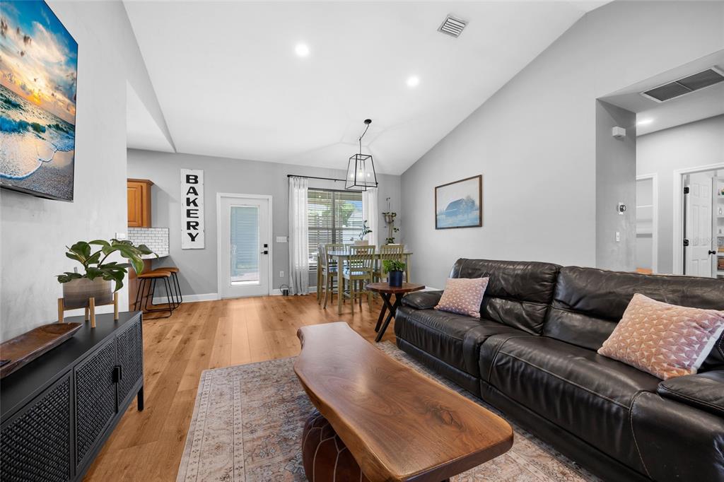 24825 Northwest 201st Road High Springs, FL 32643 - Photo 9 of 31 a living room with furniture and a flat screen tv
