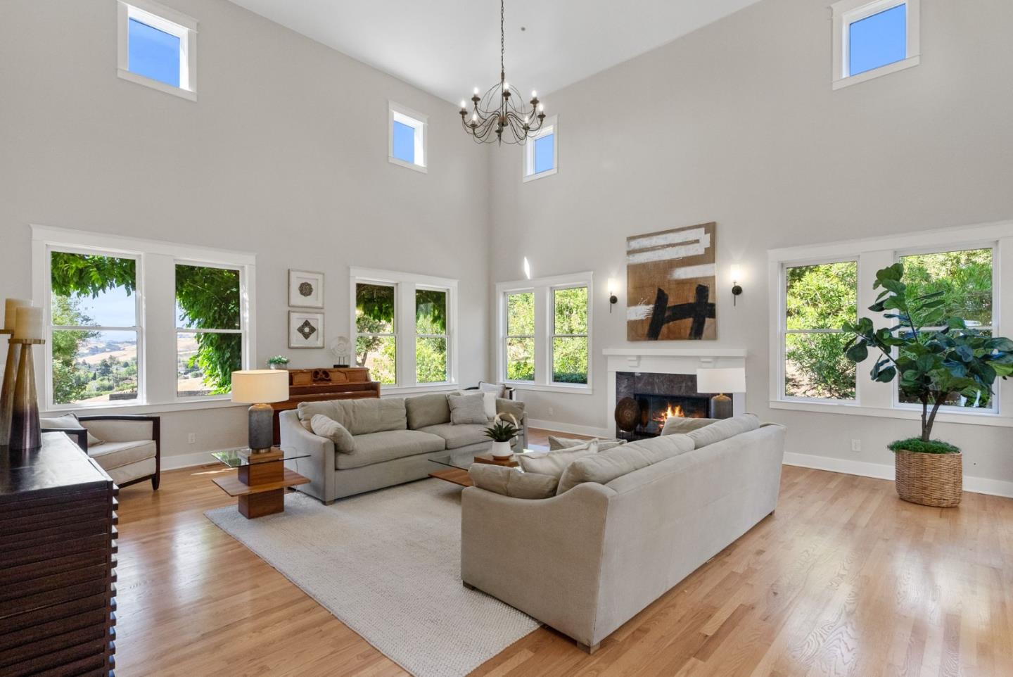 2589 Greenrock Road Milpitas, CA 95035 - Photo 11 of 76 a living room with fireplace furniture and a large window