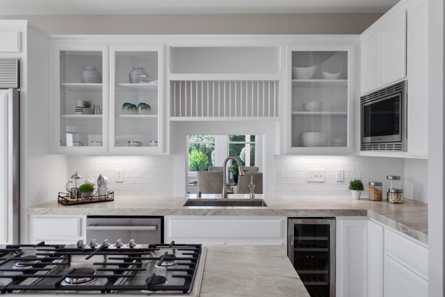 2589 Greenrock Road Milpitas, CA 95035 - Photo 14 of 76 a kitchen with stainless steel appliances a stove a sink and a microwave