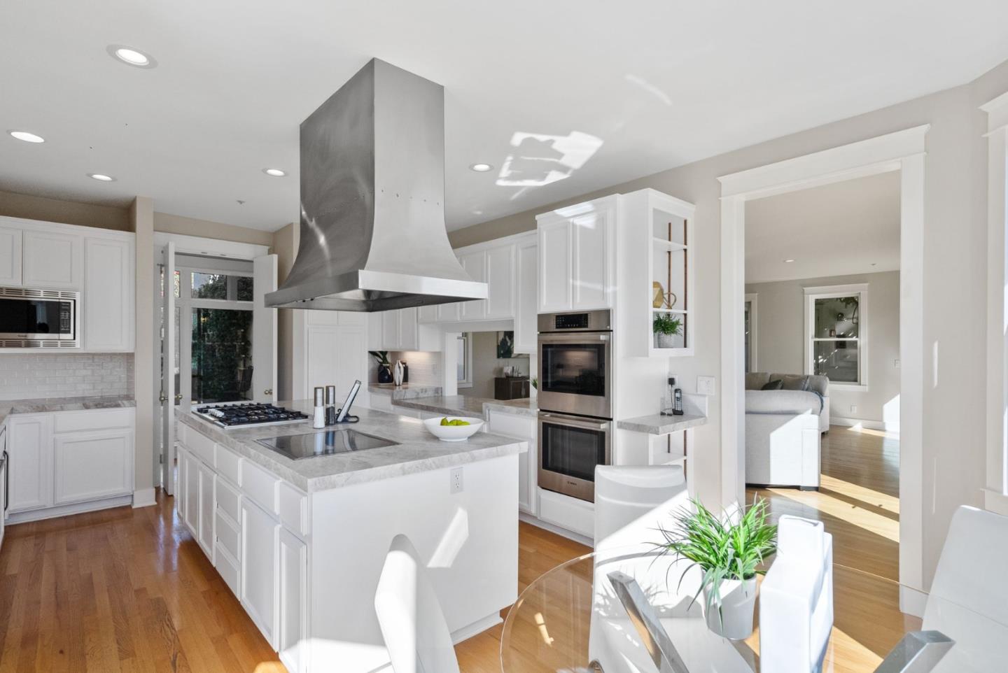 2589 Greenrock Road Milpitas, CA 95035 - Photo 15 of 76 a kitchen with stainless steel appliances kitchen island granite countertop a sink a stove and a refrigerator