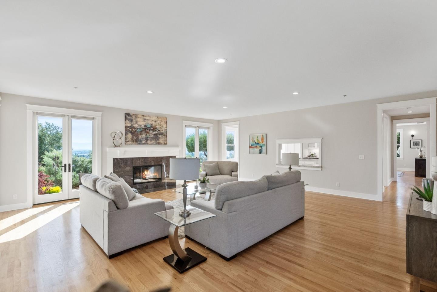 2589 Greenrock Road Milpitas, CA 95035 - Photo 21 of 76 a living room with furniture and a fireplace