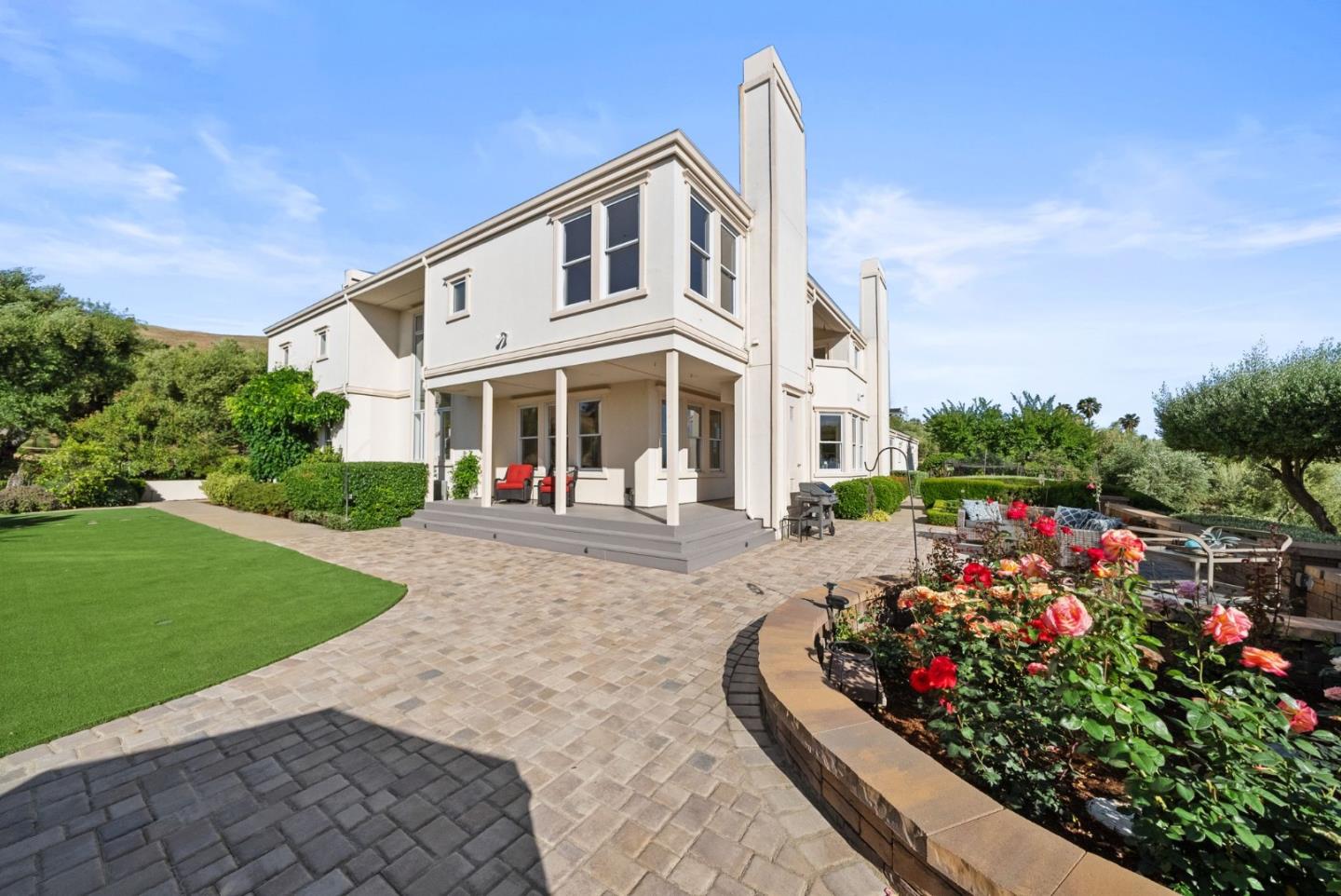 2589 Greenrock Road Milpitas, CA 95035 - Photo 48 of 76 a front view of a house with a yard and trees