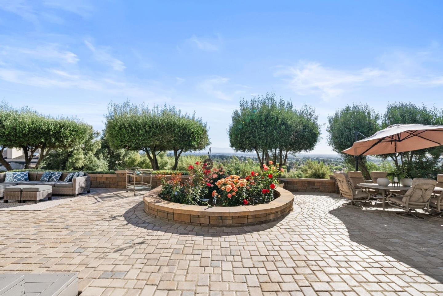2589 Greenrock Road Milpitas, CA 95035 - Photo 52 of 76 a view of a backyard with plants and a patio