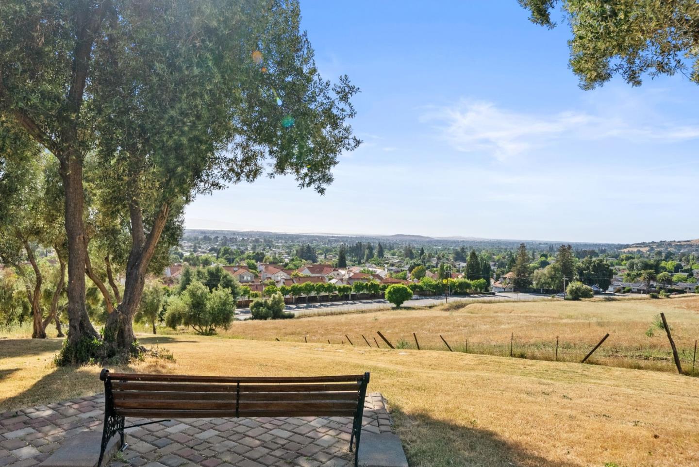 2589 Greenrock Road Milpitas, CA 95035 - Photo 55 of 76 a view of swimming pool with seating space and trees in the background