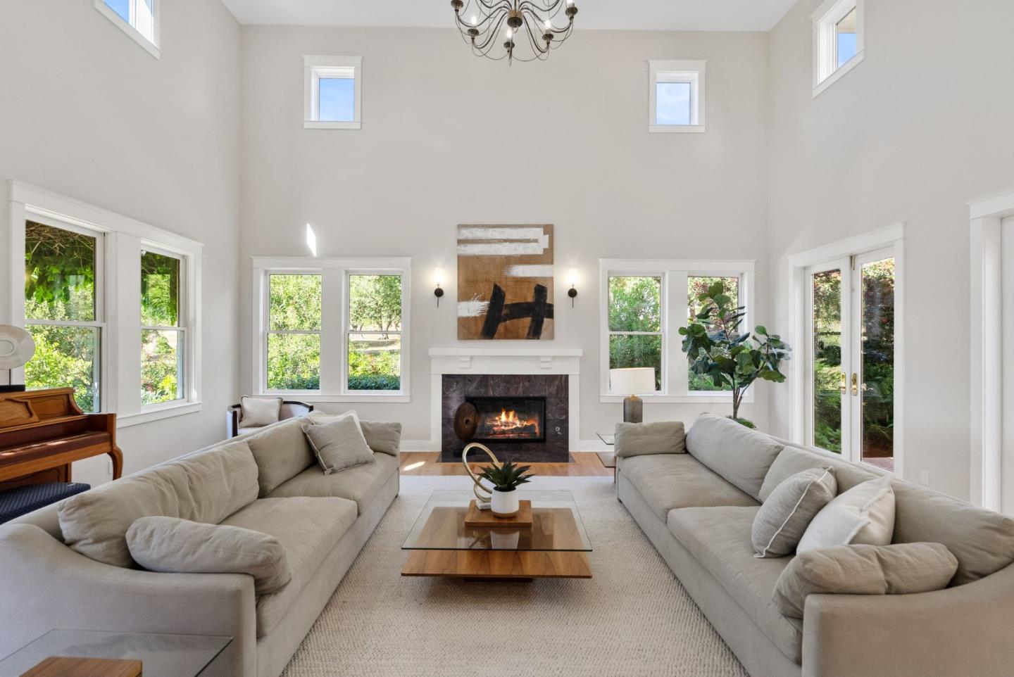 2589 Greenrock Road Milpitas, CA 95035 - Photo 10 of 76 a living room with furniture fireplace and large windows