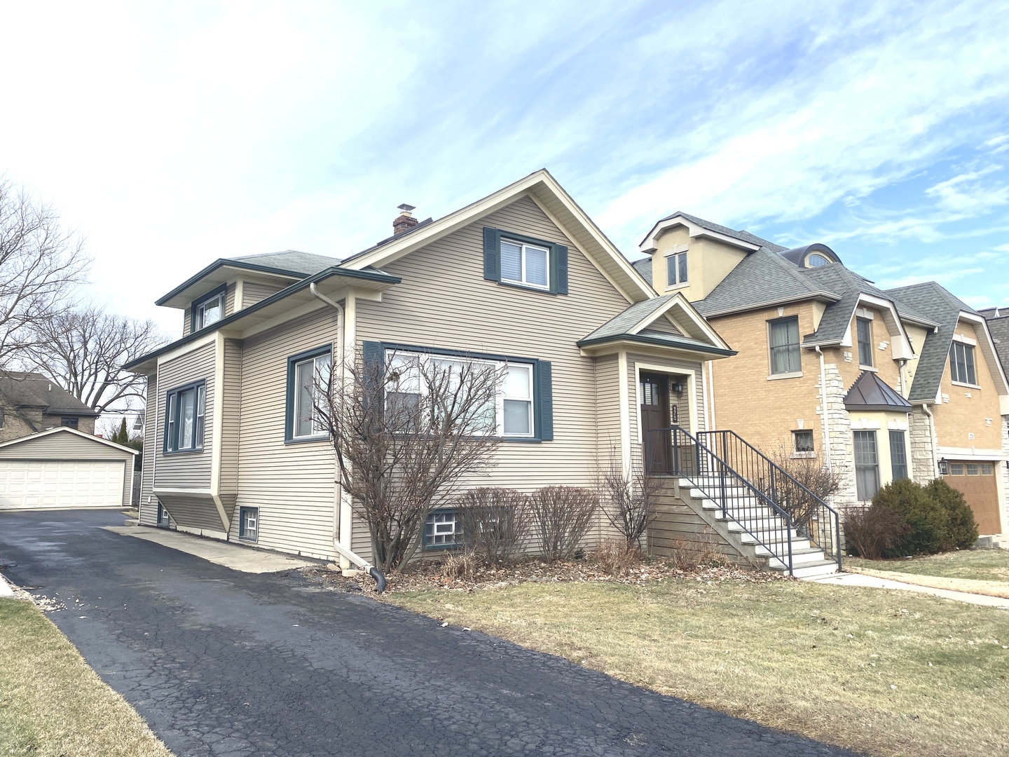 272 North Willow Road Elmhurst, IL 60126 - Photo 2 of 40 a view of a house with a yard and garage