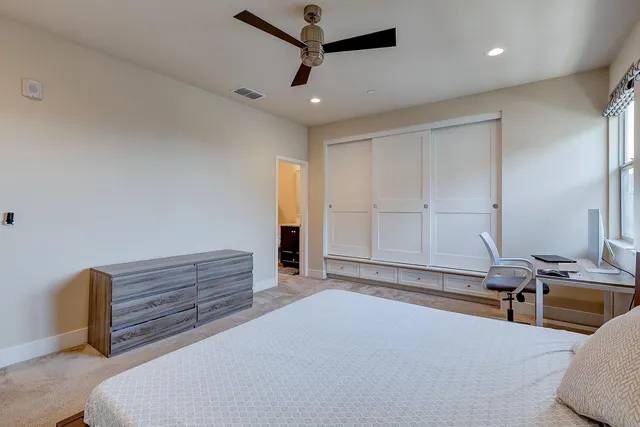 a view of a yard with table and chairs a barbeque with potted plants