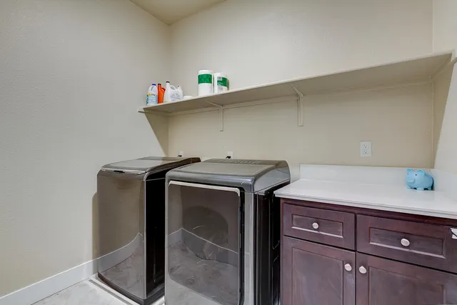 a living room with gym equipment and a large window