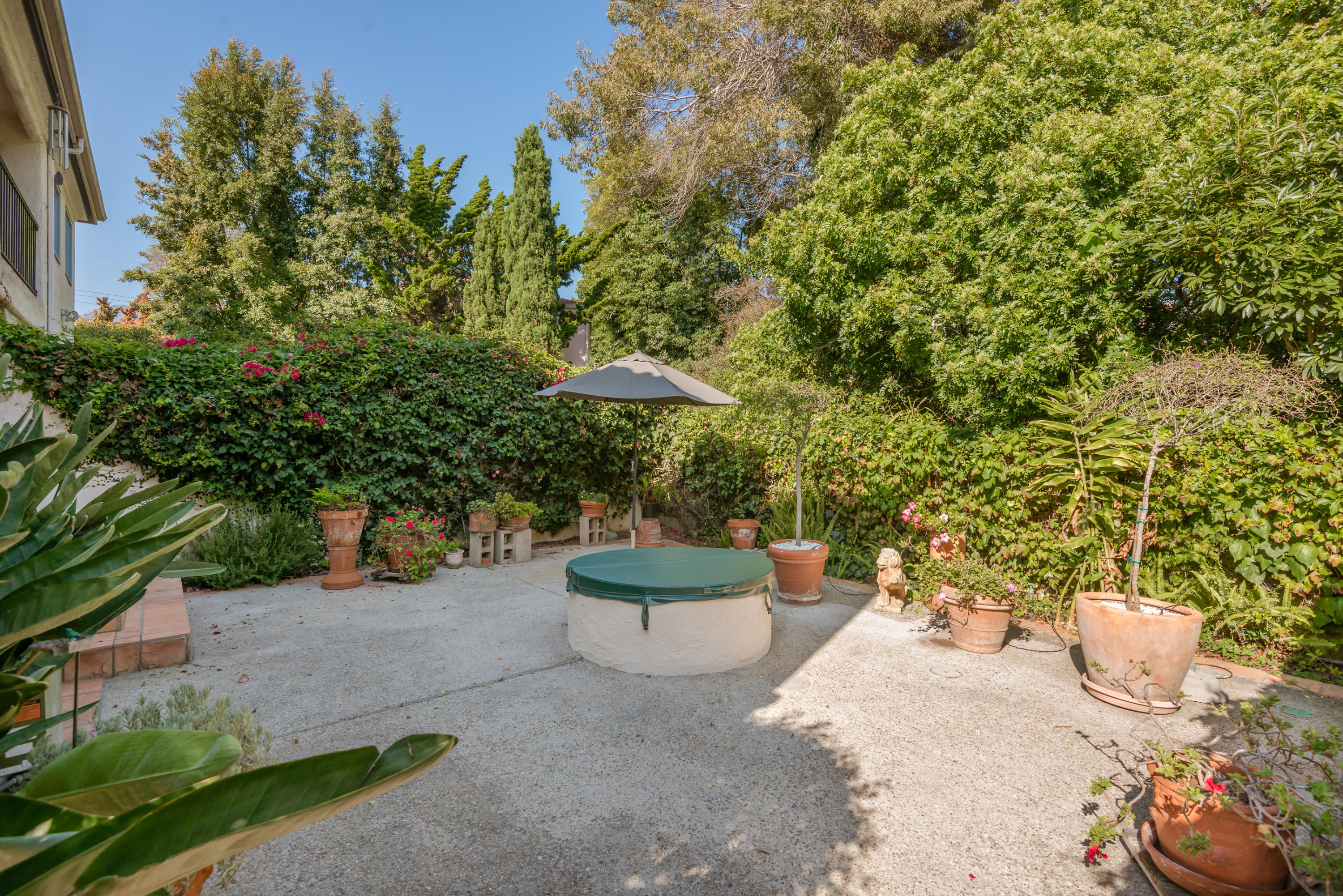 70 Olive Mill Road Montecito, CA 93108 - Photo 5 of 23 a view of a backyard with plants and a patio