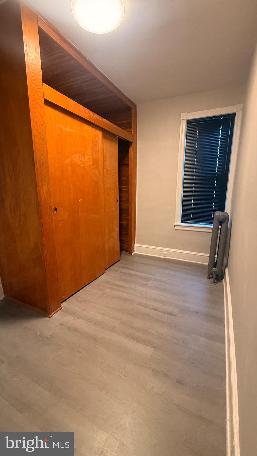 2148 South Lambert Street Philadelphia, PA 19145 - Photo 13 of 19 a view of an empty room with wooden floor
