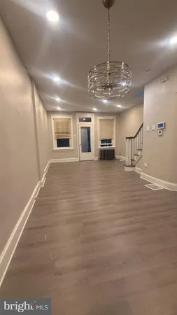 a view of a room with a chandelier