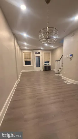 a view of a room with a chandelier