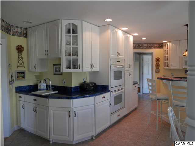 22140 Monrovia Road Orange, VA 22960 - Photo 17 of 43 Wet bar, glass cabinet fronts