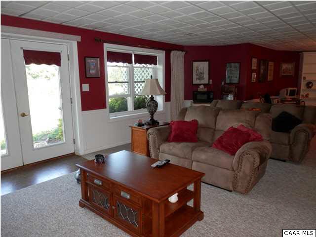 22140 Monrovia Road Orange, VA 22960 - Photo 30 of 43 Family Room showing French doors to the side yard, full widows for a well lit room.