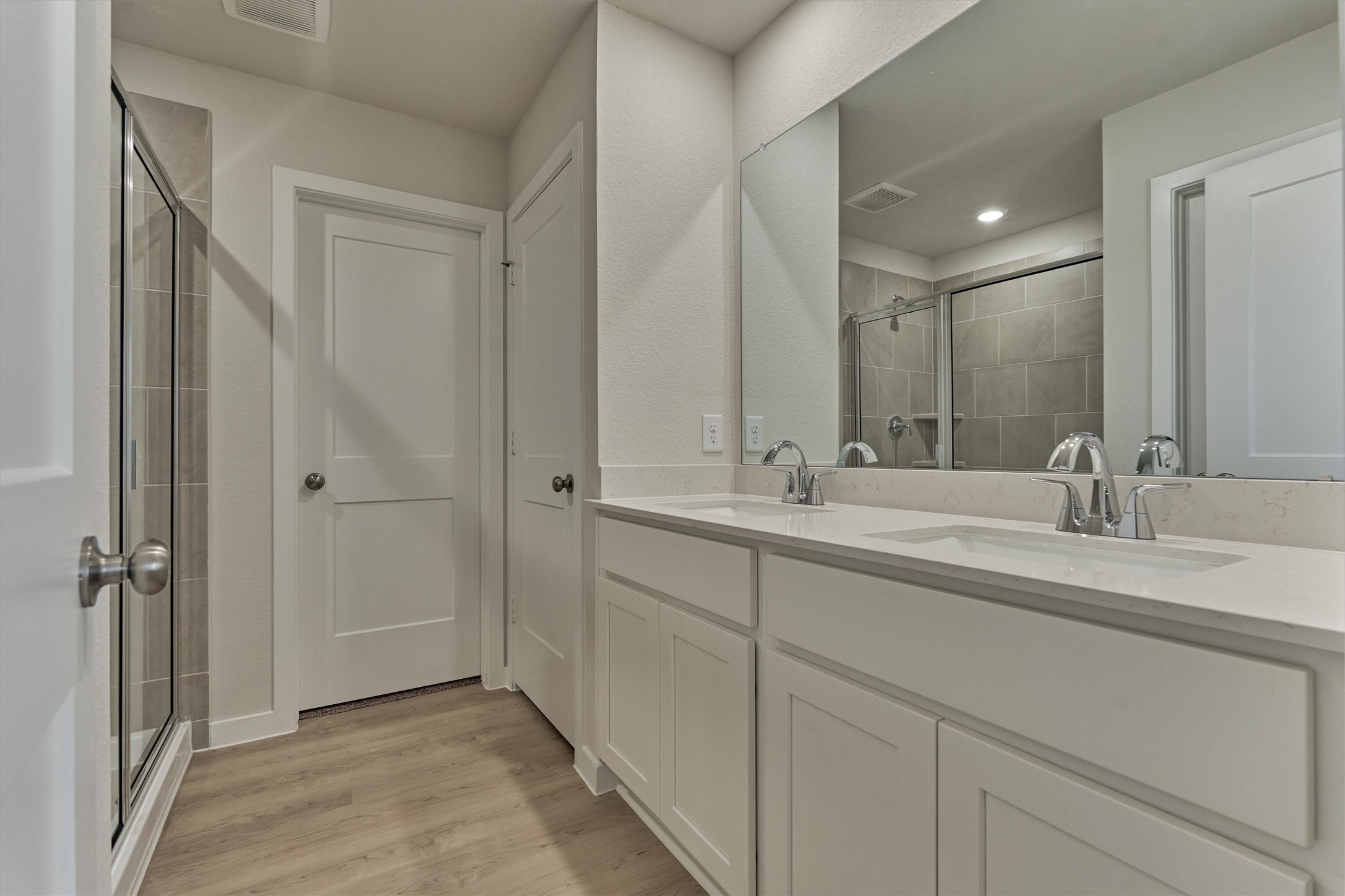 282 Brazen Forest Trail Magnolia, TX 77355 - Photo 20 of 36 a bathroom with double sink and a mirror