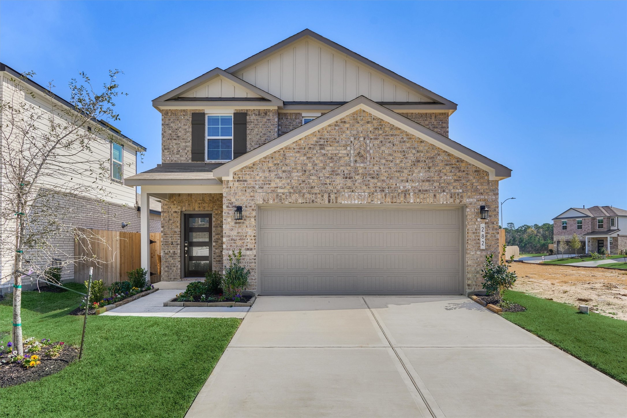282 Brazen Forest Trail Magnolia, TX 77355 - Photo 2 of 36 a view of house with yard and entertaining space