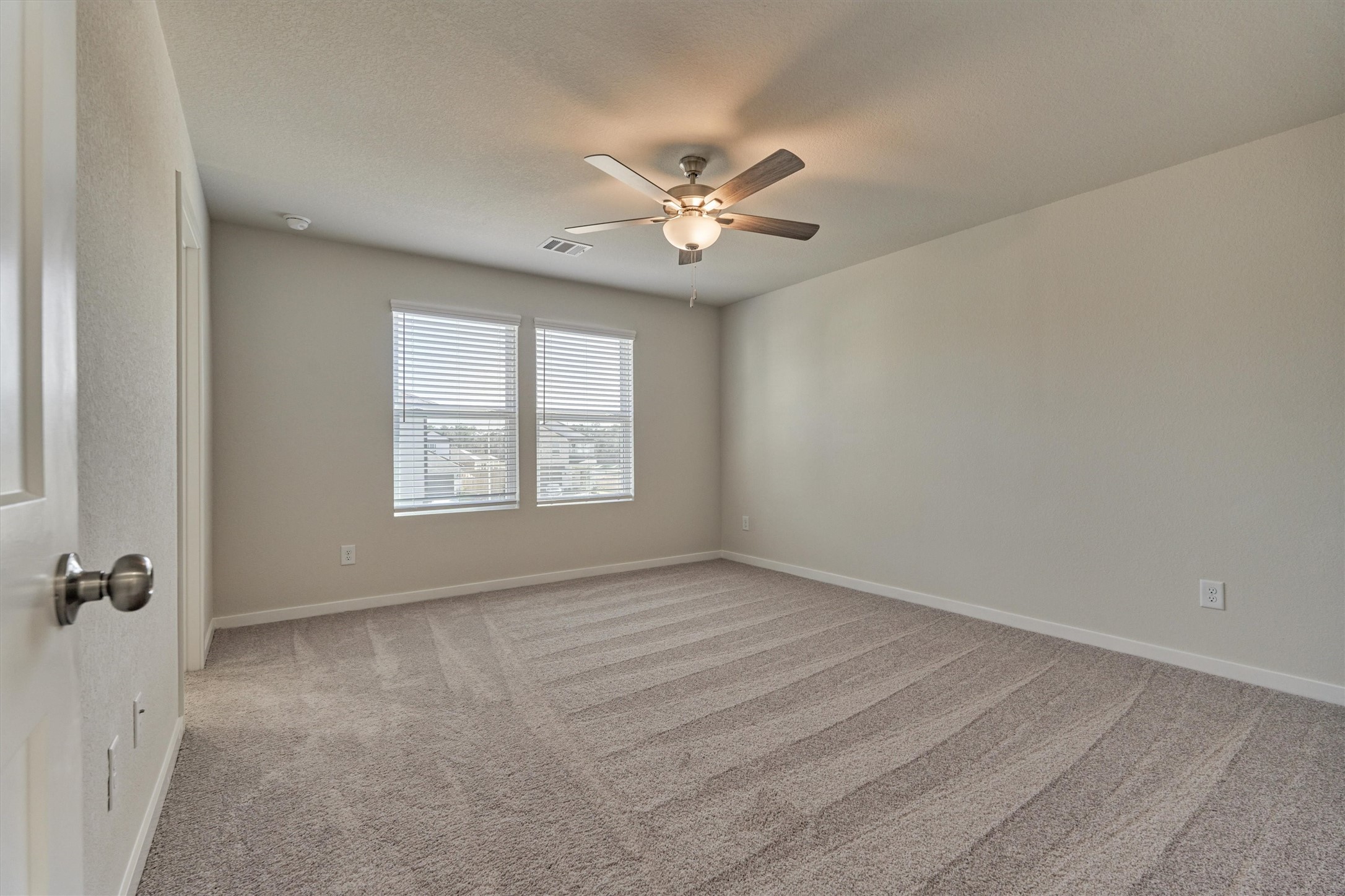 282 Brazen Forest Trail Magnolia, TX 77355 - Photo 23 of 36 a view of an empty room with a window