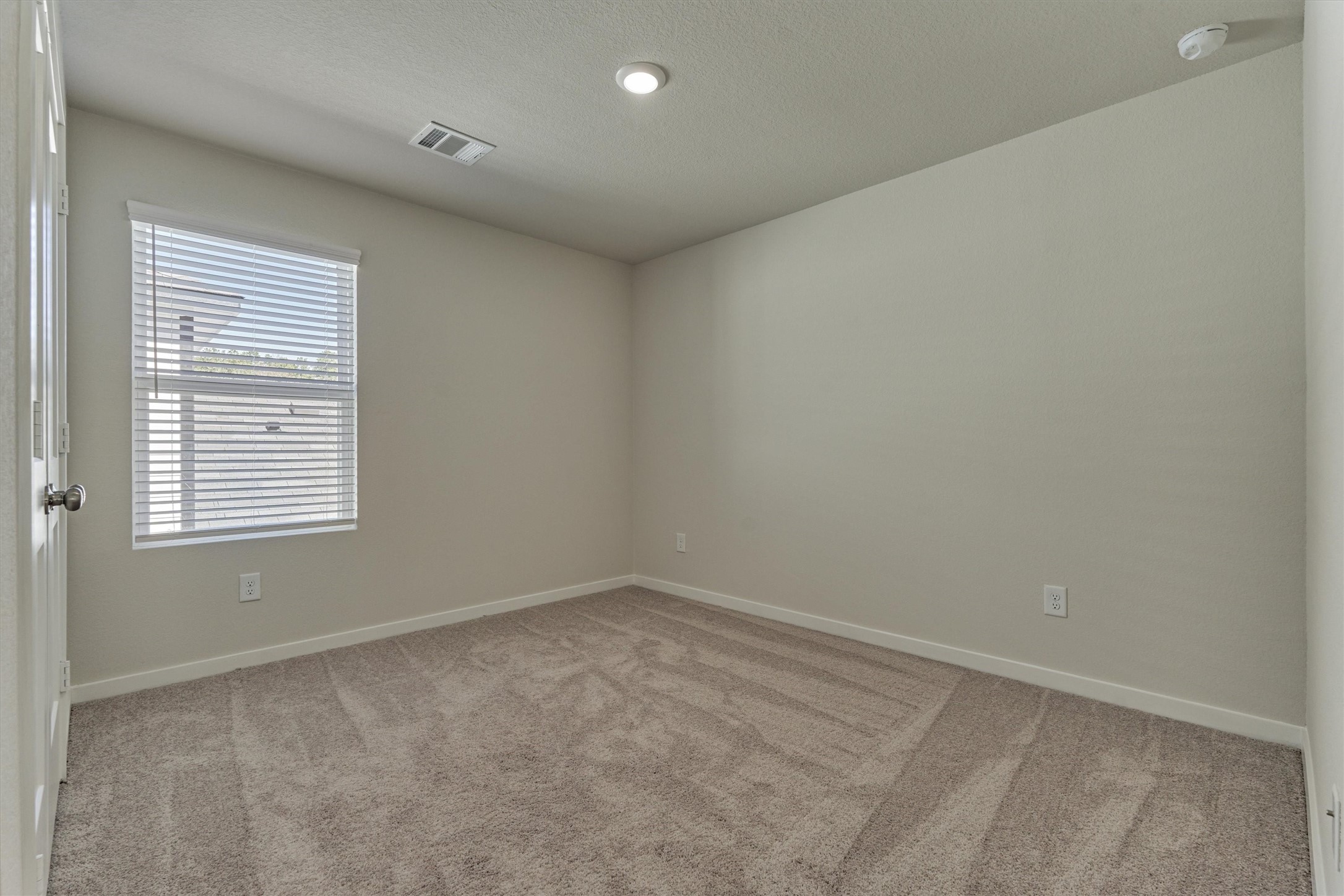 282 Brazen Forest Trail Magnolia, TX 77355 - Photo 24 of 36 an empty room with a window