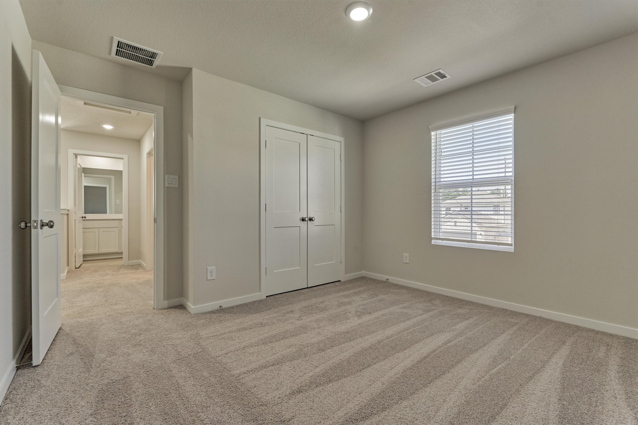 282 Brazen Forest Trail Magnolia, TX 77355 - Photo 25 of 36 a view of an empty room with closet and a window