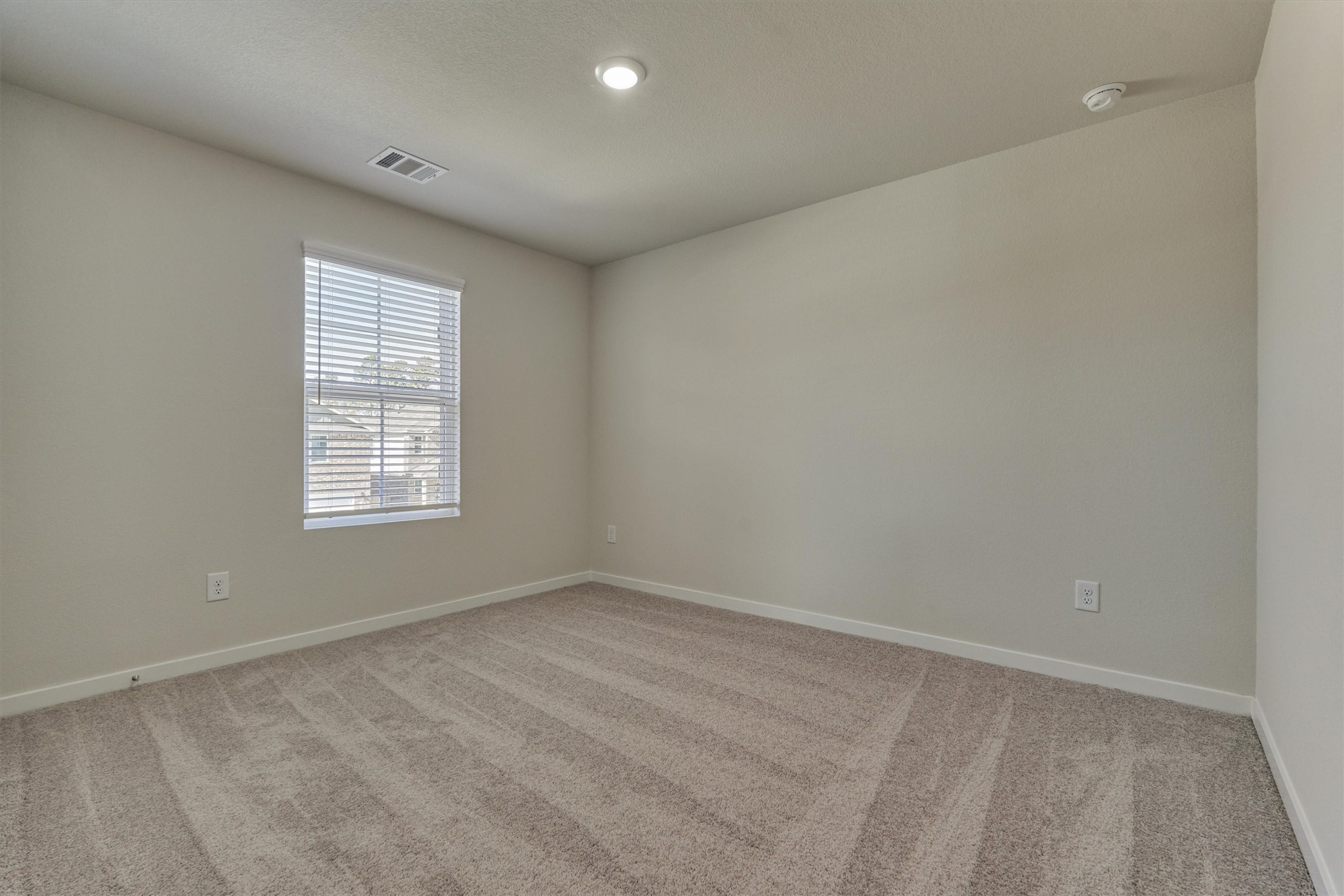 282 Brazen Forest Trail Magnolia, TX 77355 - Photo 28 of 36 an empty room with a window