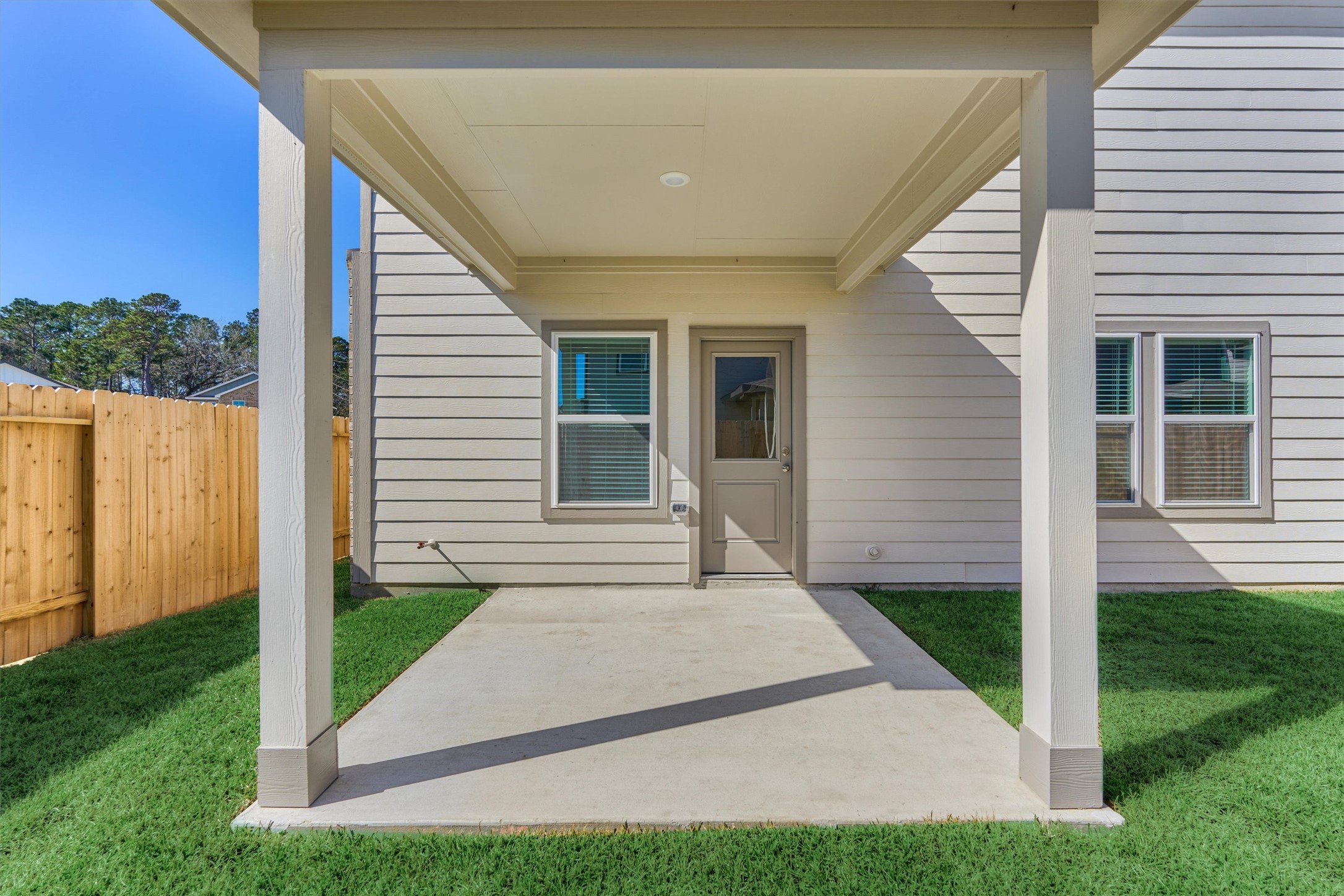 282 Brazen Forest Trail Magnolia, TX 77355 - Photo 35 of 36 a view of a house with backyard and porch