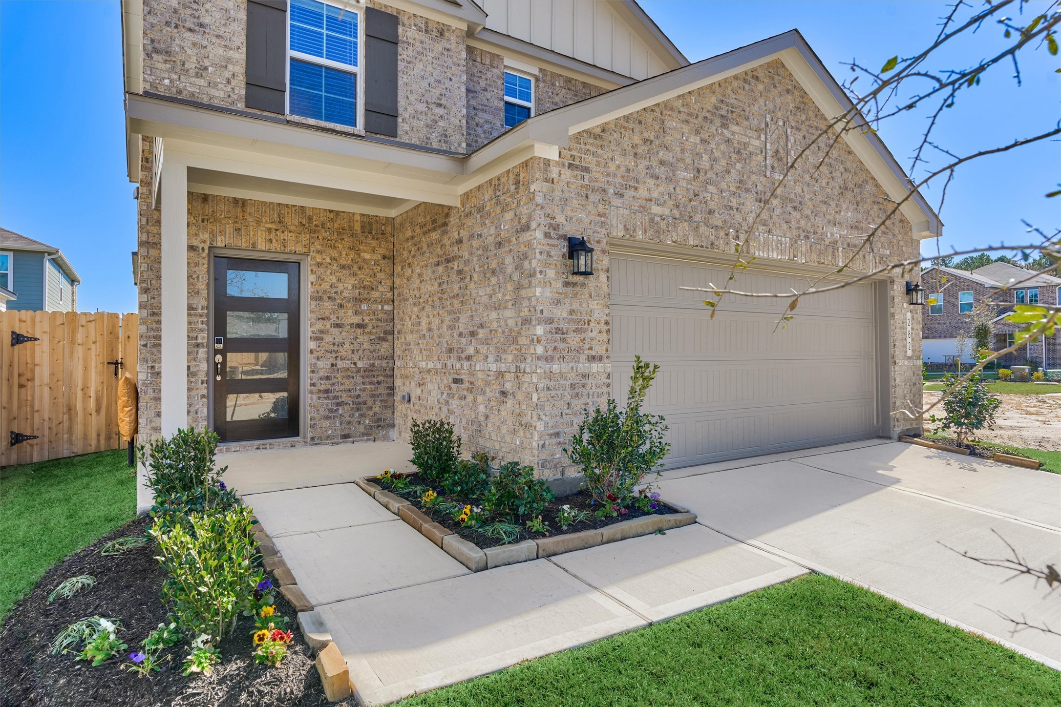 282 Brazen Forest Trail Magnolia, TX 77355 - Photo 5 of 36 a front view of a house with garden