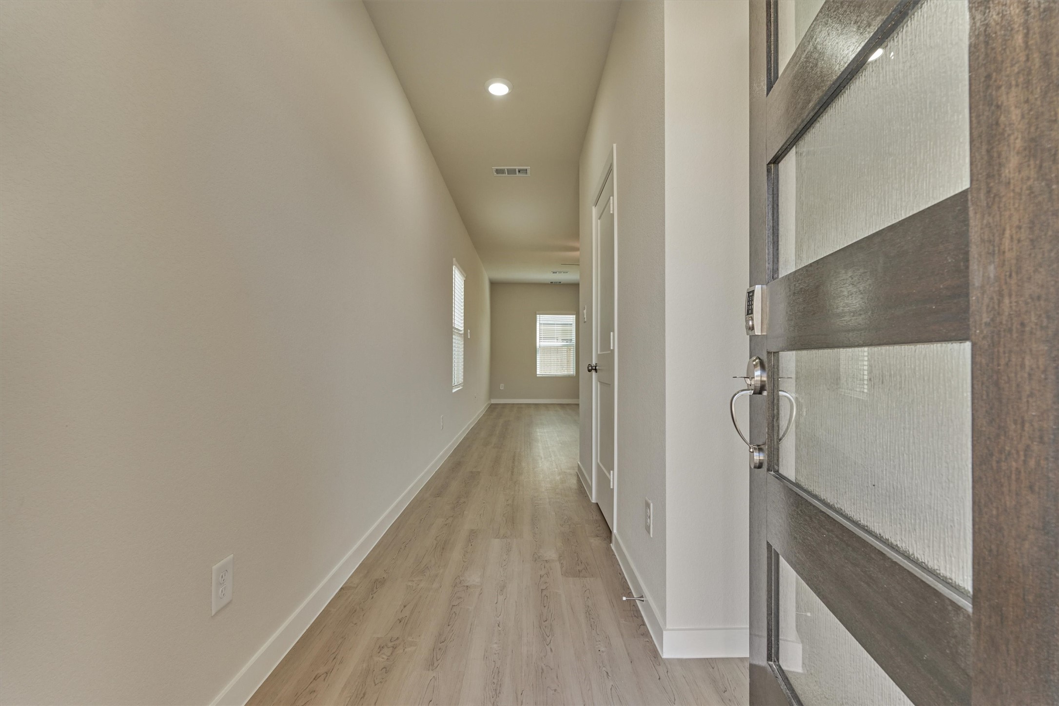 282 Brazen Forest Trail Magnolia, TX 77355 - Photo 6 of 36 a view of hallway with wooden floor