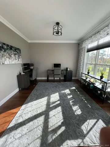 a living room with furniture window and a table