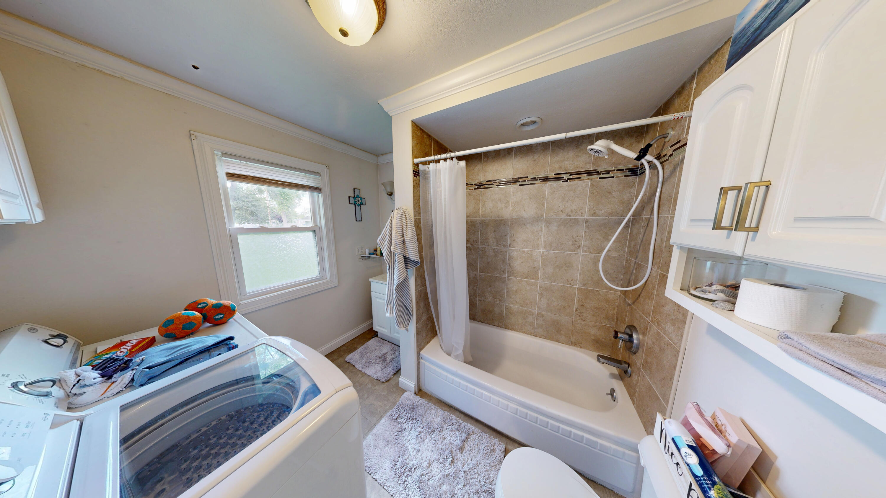4305 Colfax Street Gary, IN 46408 - Photo 12 of 27 a bathroom with a sink toilet and shower