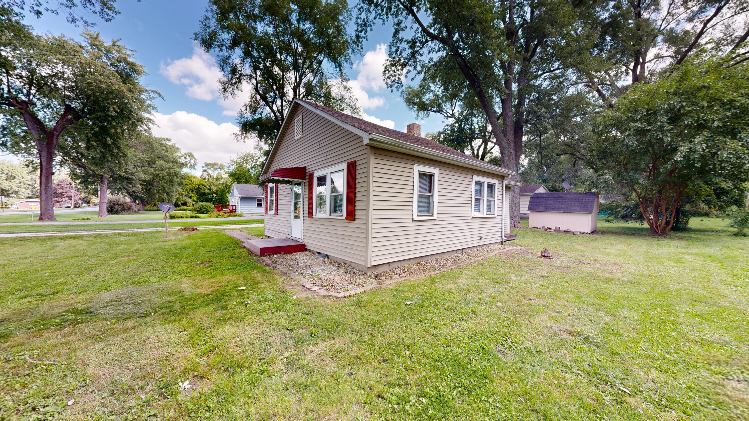 4305 Colfax Street Gary, IN 46408 - Photo 16 of 27 a view of a house with a yard
