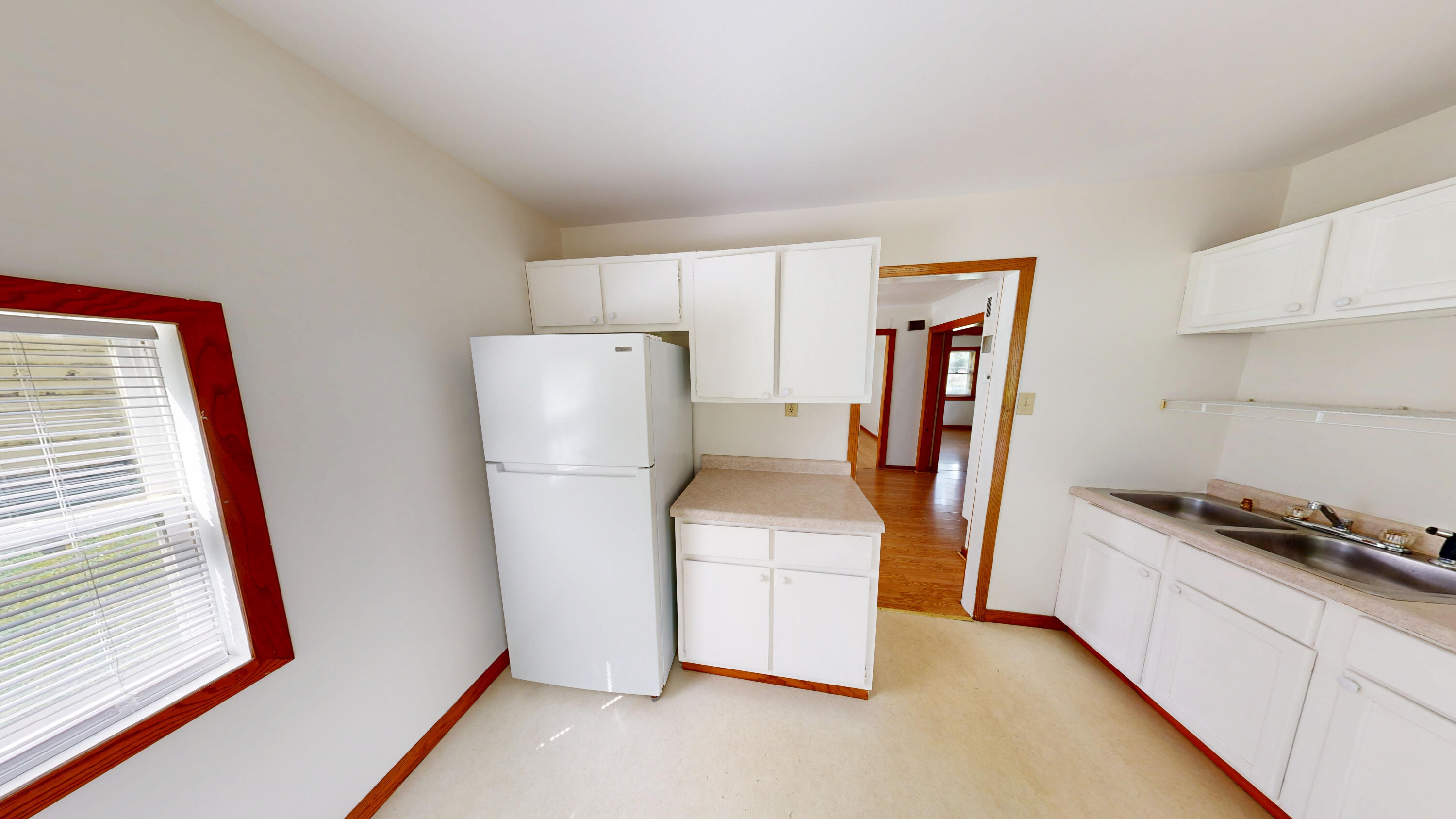 4305 Colfax Street Gary, IN 46408 - Photo 24 of 27 a kitchen with a refrigerator and a stove