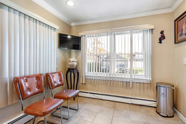 a living room with furniture and a window
