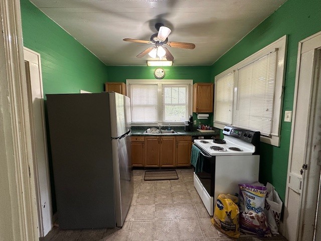 235 Old Mulberry Road Fayetteville, TN 37334 - Photo 11 of 37 a kitchen with a refrigerator and a sink