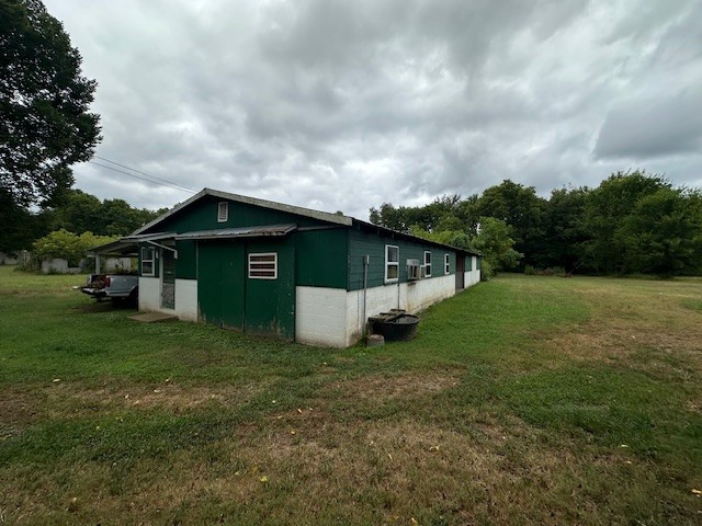 235 Old Mulberry Road Fayetteville, TN 37334 - Photo 18 of 37 a view of a barn in the middle of a yard