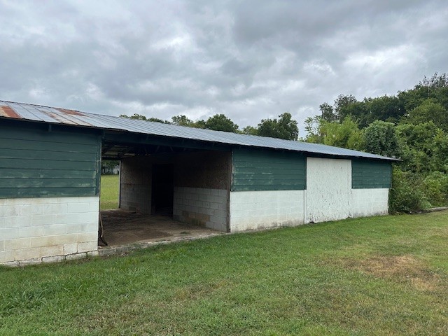 235 Old Mulberry Road Fayetteville, TN 37334 - Photo 19 of 37 a backyard of a house with lots of green space