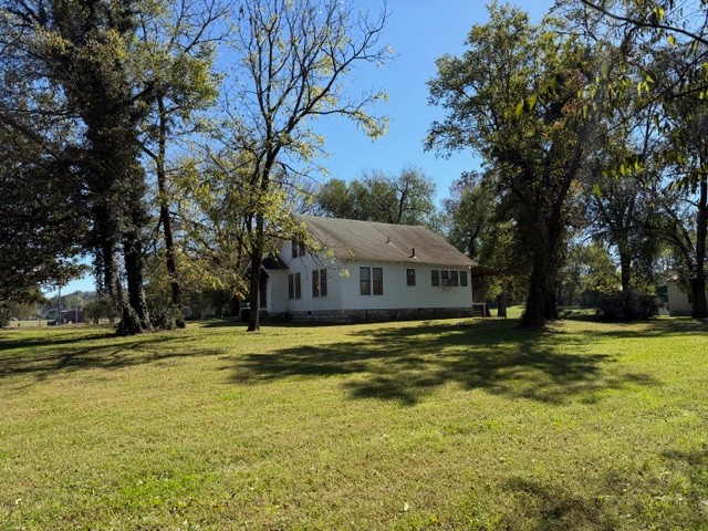 235 Old Mulberry Road Fayetteville, TN 37334 - Photo 2 of 37 a swimming pool is sitting in the middle of a lake